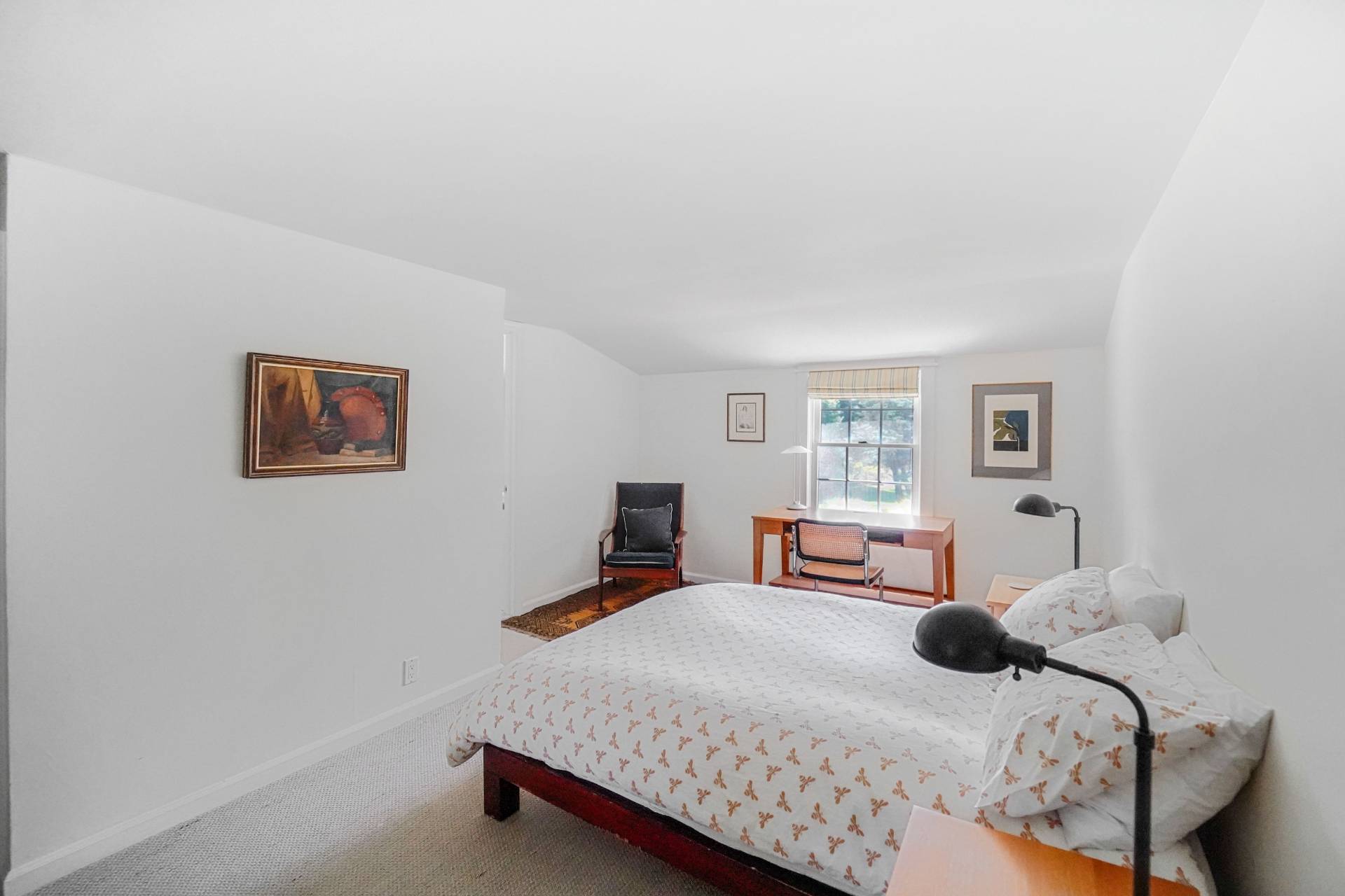 25 Club Lane Remsenburg, NY 11960 - Photo 16 of 18 a bedroom with a bed and a window