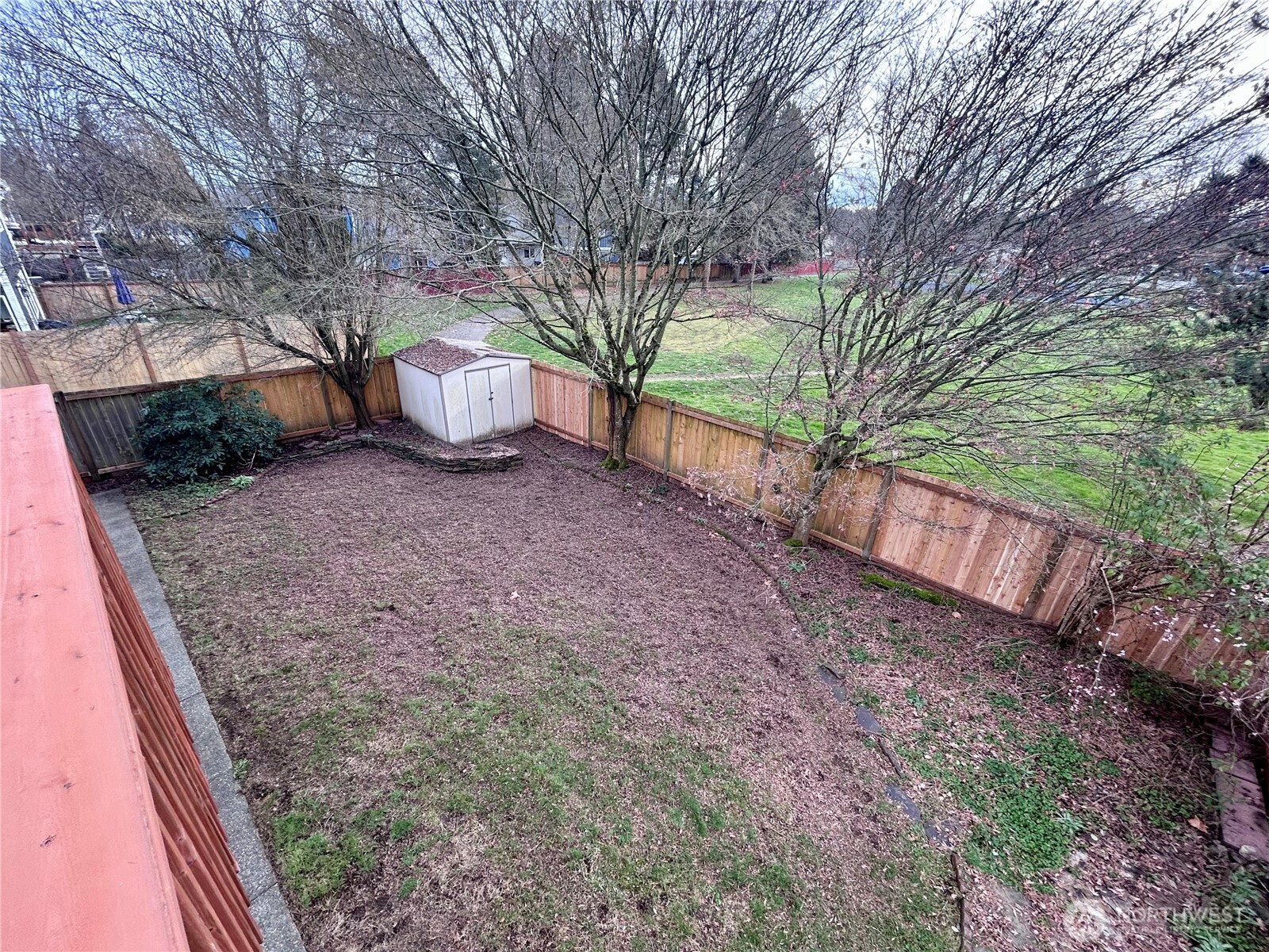 17254 153rd Street Southeast Monroe, WA 98272 - Photo 17 of 17 a view of a backyard with large trees and barn