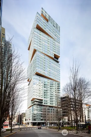 a tall building sitting on the side of a street