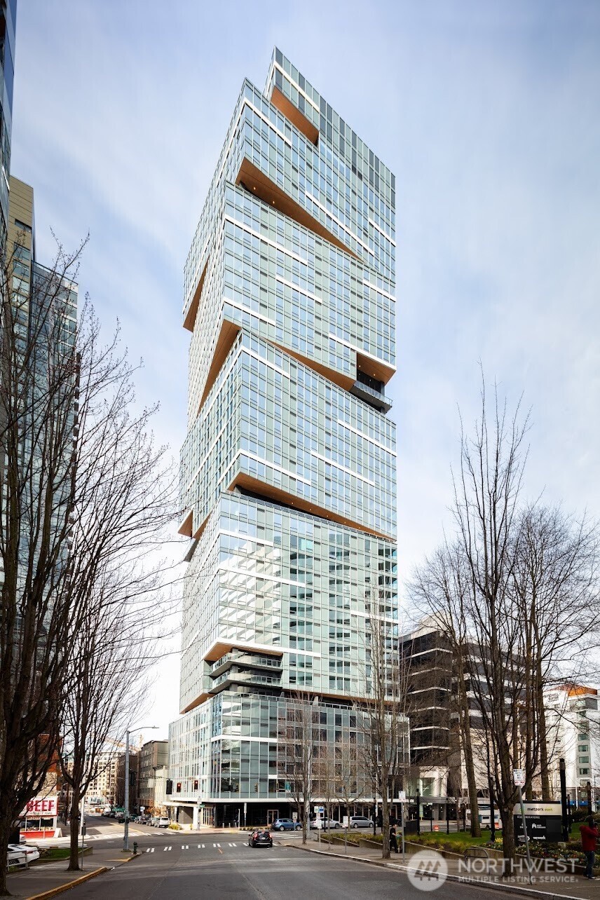 a tall building sitting on the side of a street