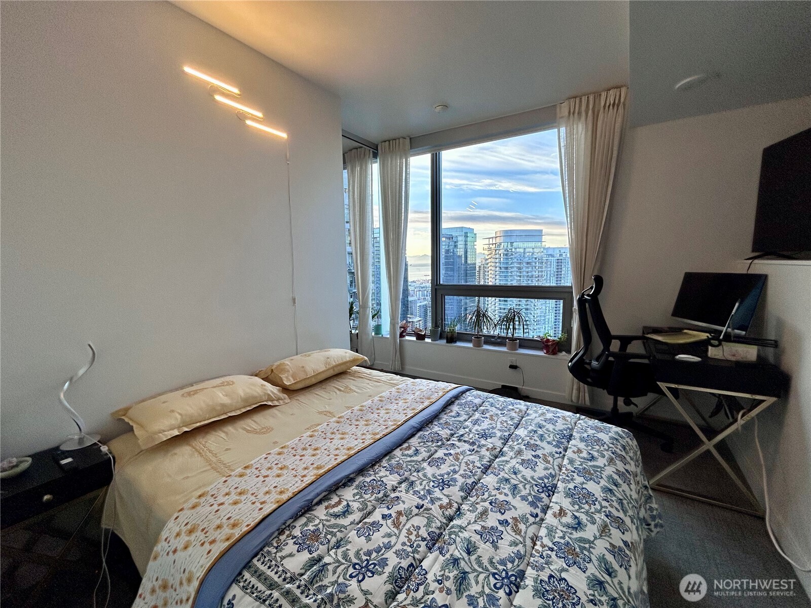 1808 Minor Avenue, Unit 3706 Seattle, WA 98101 - Photo 20 of 26 a bedroom with a bed and large windows