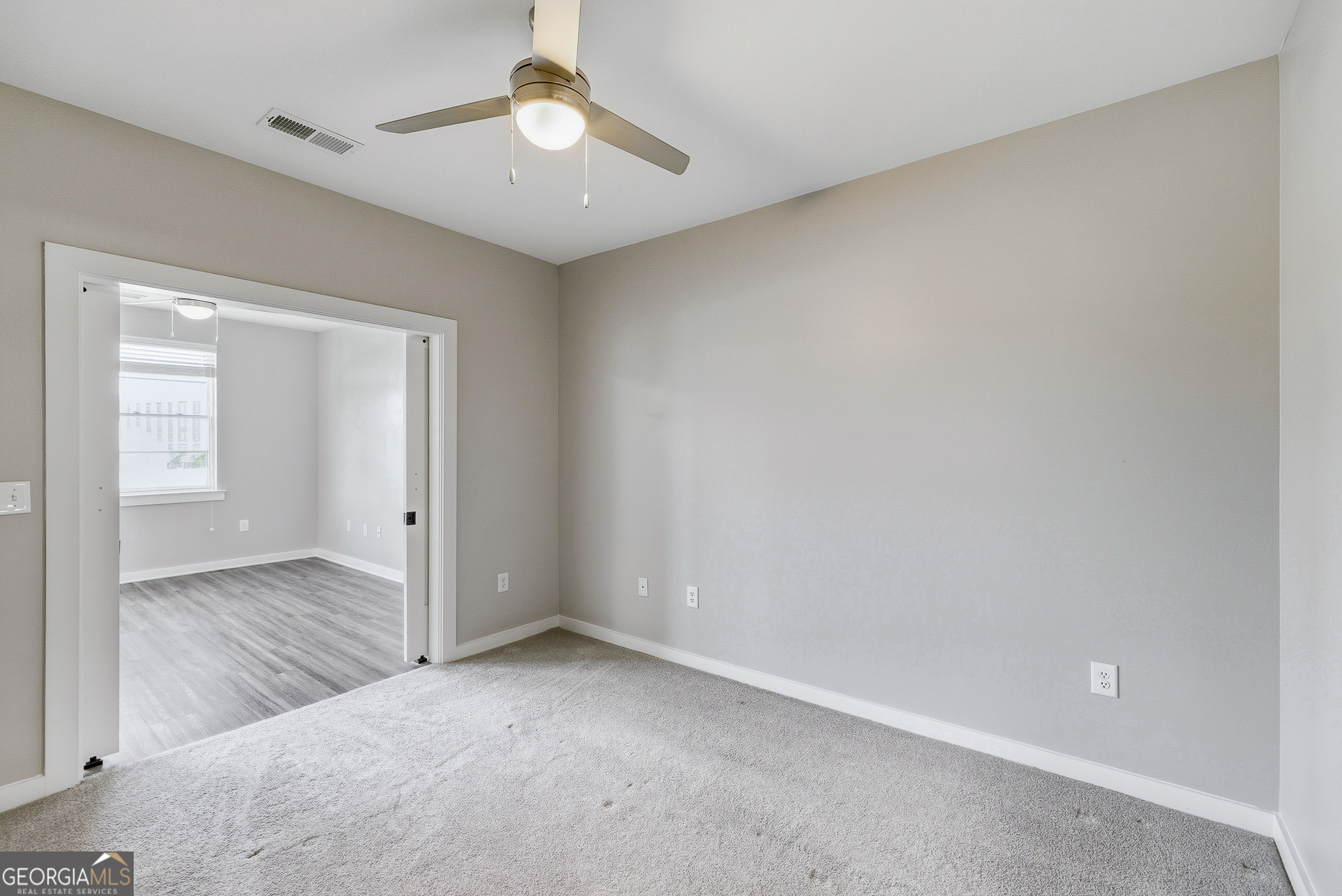 100 Prince Avenue, Unit A303 Athens, GA 30601 - Photo 17 of 27 an empty room with a bathroom