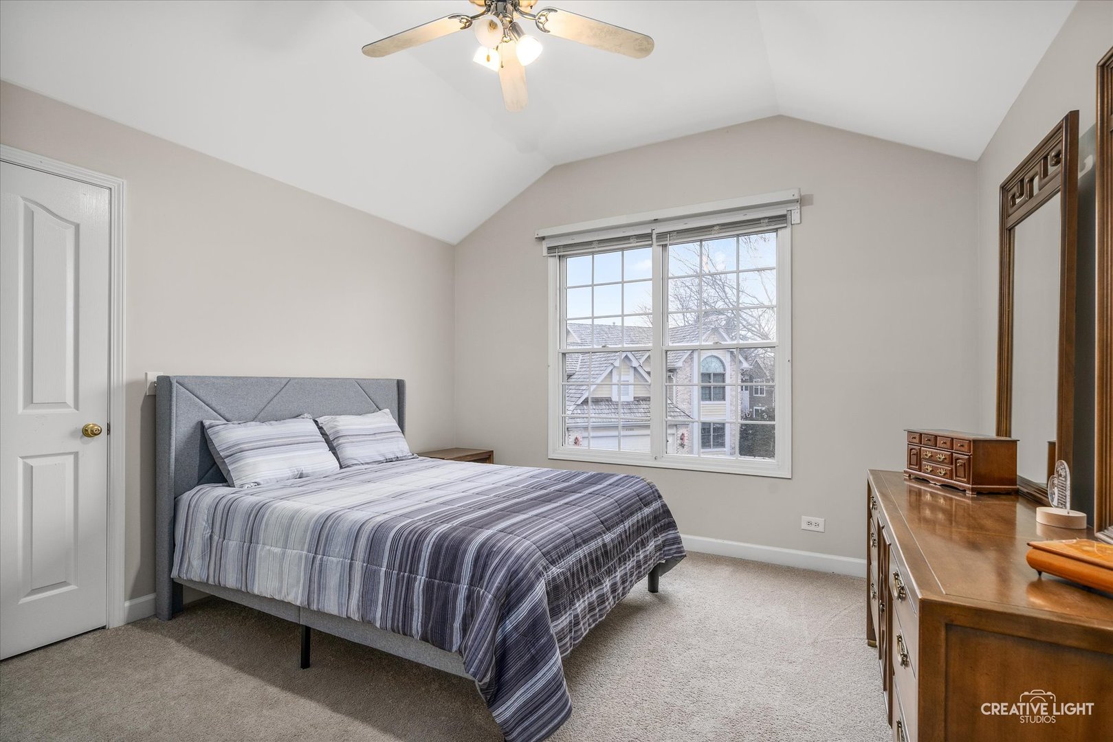 2262 Brookside Lane Aurora, IL 60502 - Photo 18 of 37 a bedroom with a bed wooden floor and window