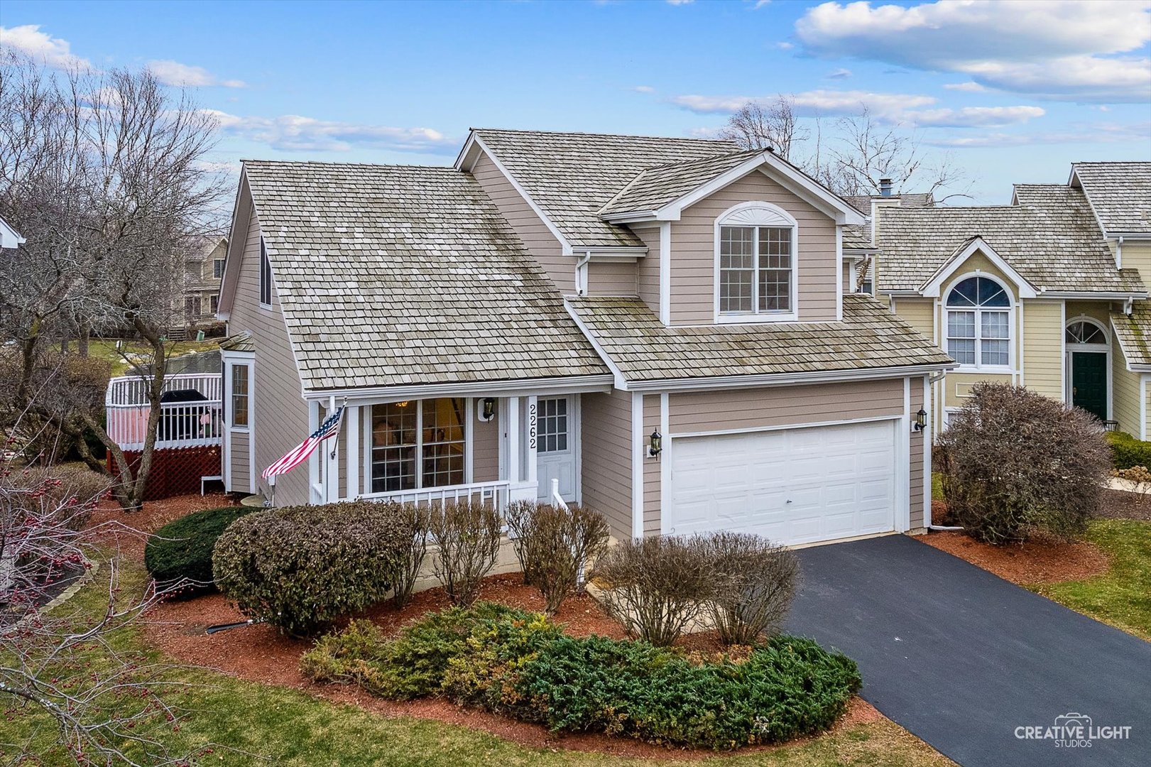 2262 Brookside Lane Aurora, IL 60502 - Photo 2 of 37 a front view of a house with a yard