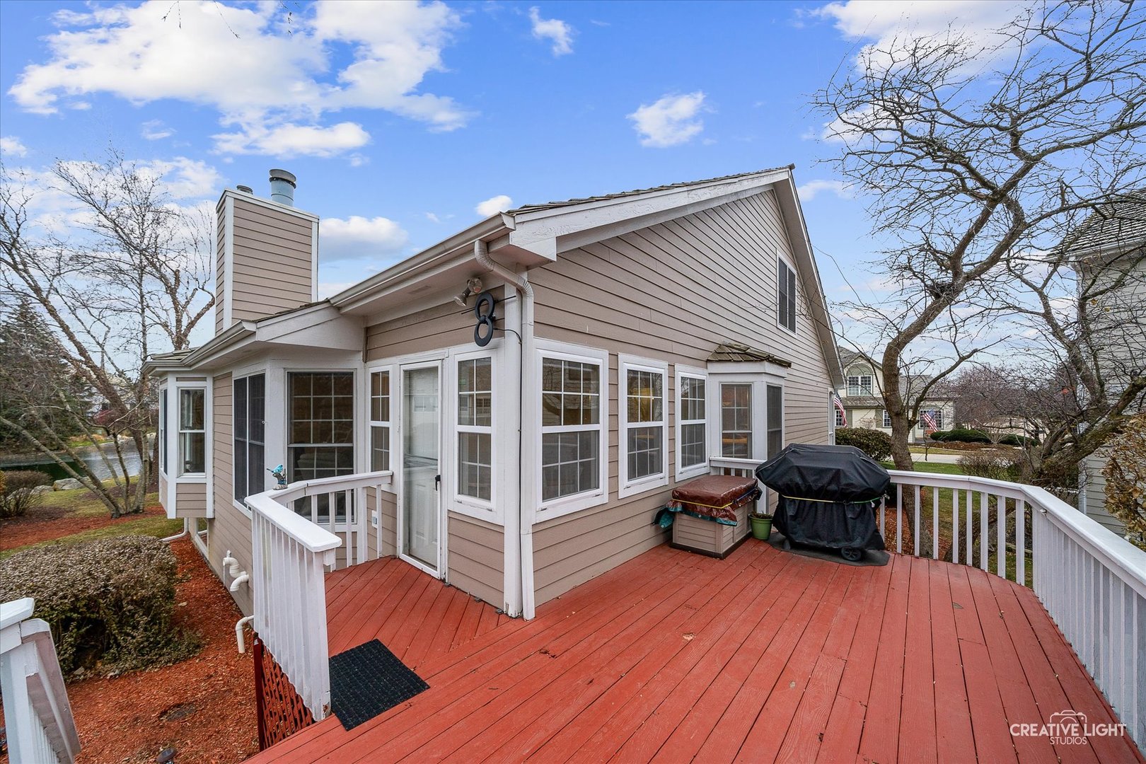 2262 Brookside Lane Aurora, IL 60502 - Photo 26 of 37 a view of a house with wooden deck and furniture
