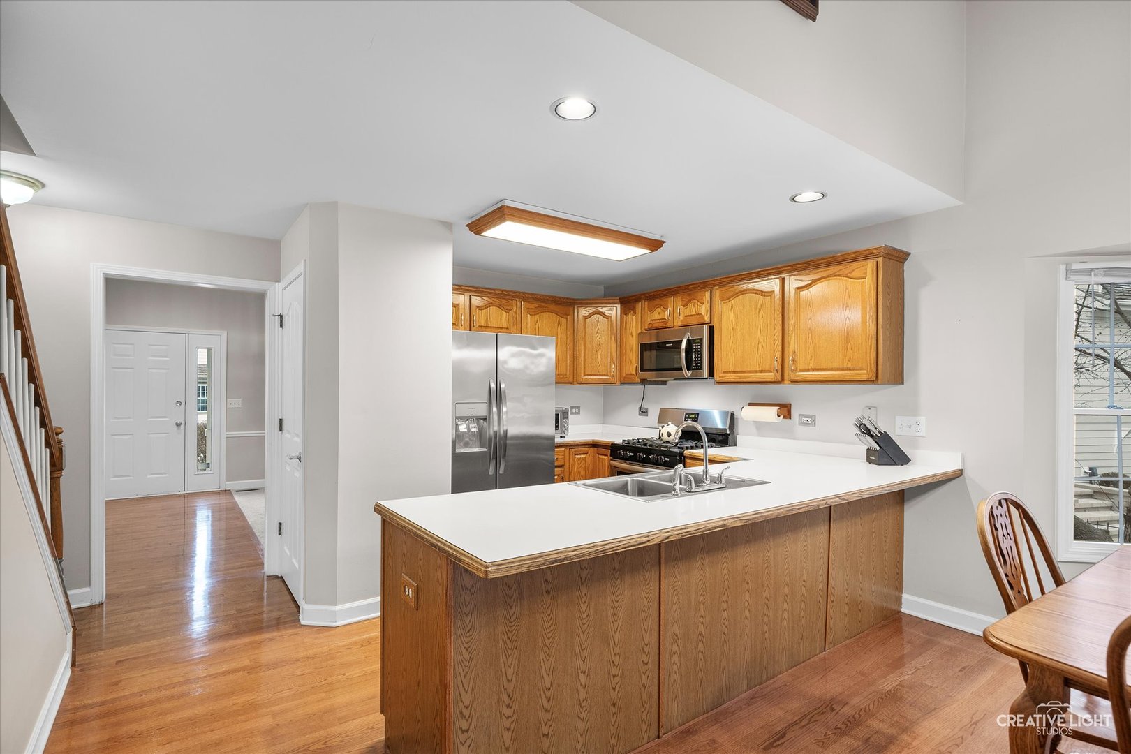 2262 Brookside Lane Aurora, IL 60502 - Photo 6 of 37 a view of a kitchen counter space and a sink