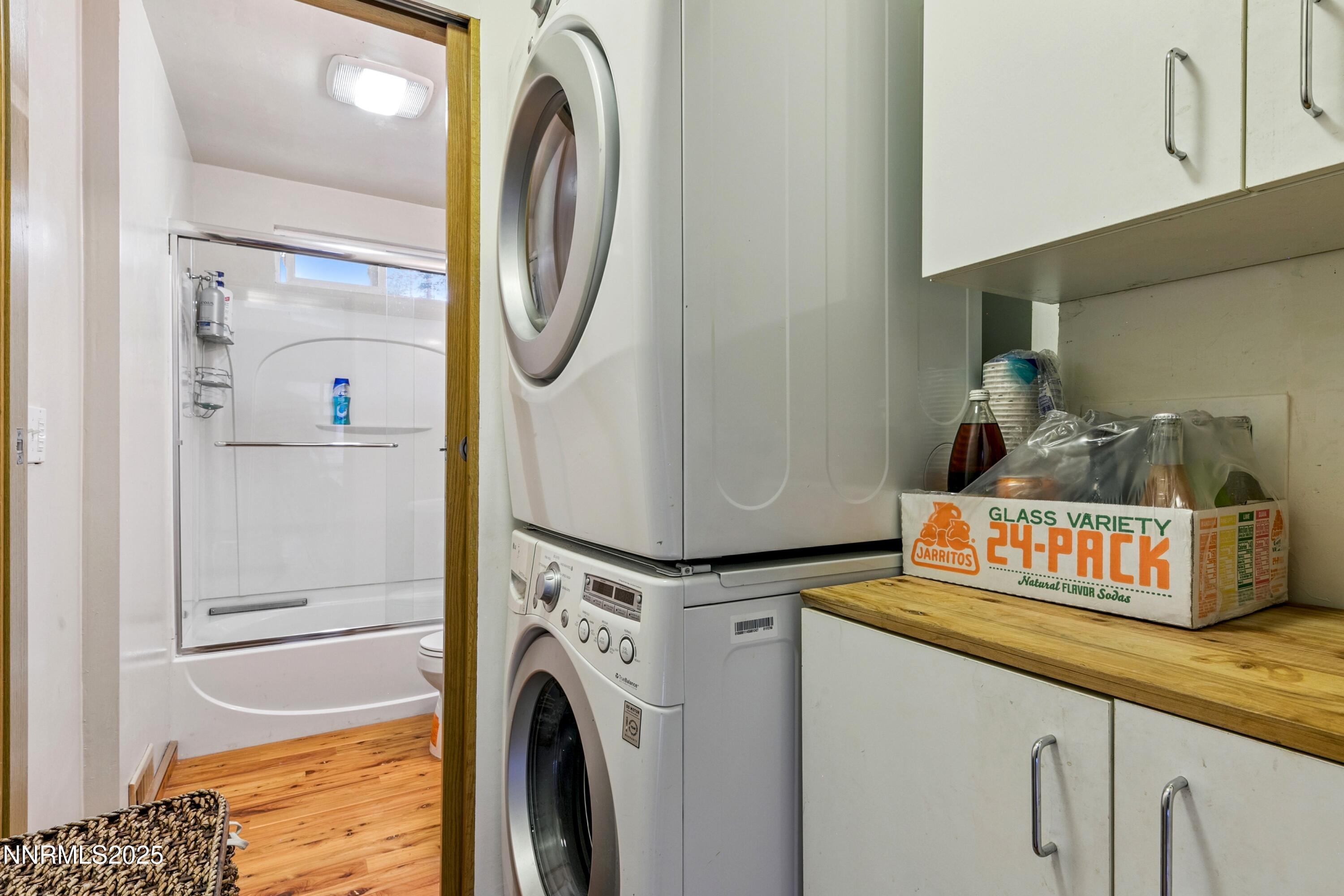 280 Chimney Rock Road Stateline, NV 89449 - Photo 9 of 26 a utility room with dryer and washer