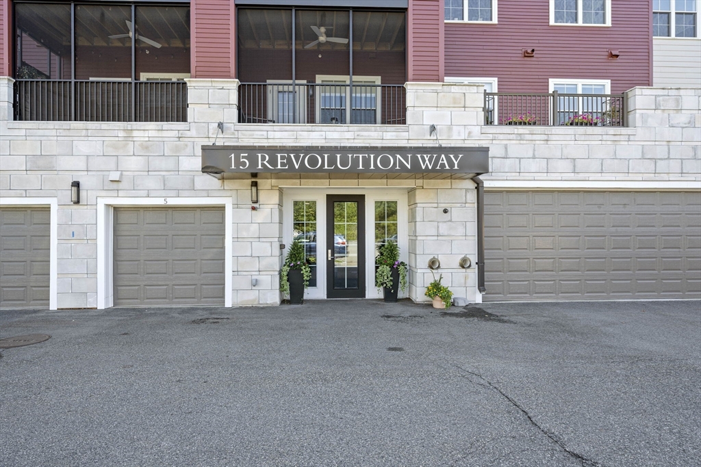 15 Revolution Way, Unit 2107 Canton, MA 02021 - Photo 3 of 40 front view of a building with glass windows