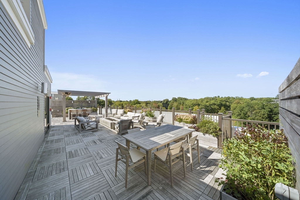15 Revolution Way, Unit 2107 Canton, MA 02021 - Photo 31 of 40 a view of a terrace with seating area