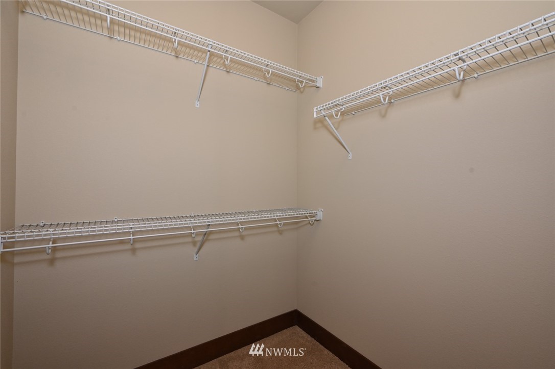 3805 Northeast 3rd Place Renton, WA 98056 - Photo 22 of 30 a view of a room with racks on the wall