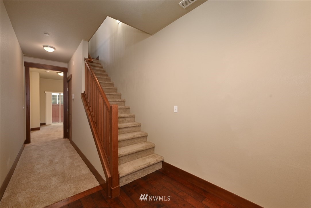 3805 Northeast 3rd Place Renton, WA 98056 - Photo 4 of 30 a view of entryway with wooden floor