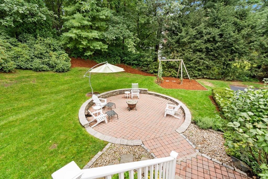 35 Hawes Road Sudbury, MA 01776 - Photo 3 of 41 a view of a swimming pool with a garden