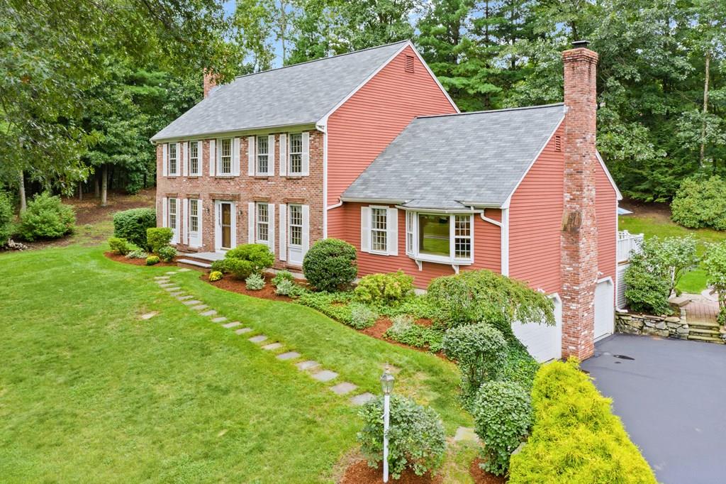 35 Hawes Road Sudbury, MA 01776 - Photo 41 of 41 a front view of a house with a yard