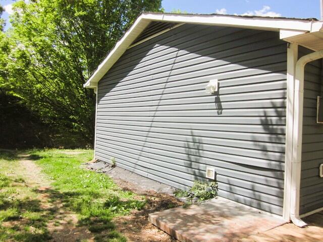 5574 Providence Church Road Ferrum, VA 24088 - Photo 3 of 17 a front view of a house with garden
