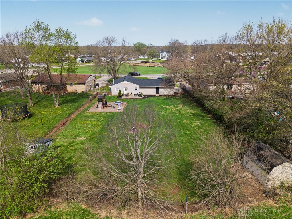 8969 Franklin-Trenton Road Franklin, OH 45005 - Photo 5 of 49 Expansive green spaces surround this welcoming home, perfect for outdoor enjoyment.