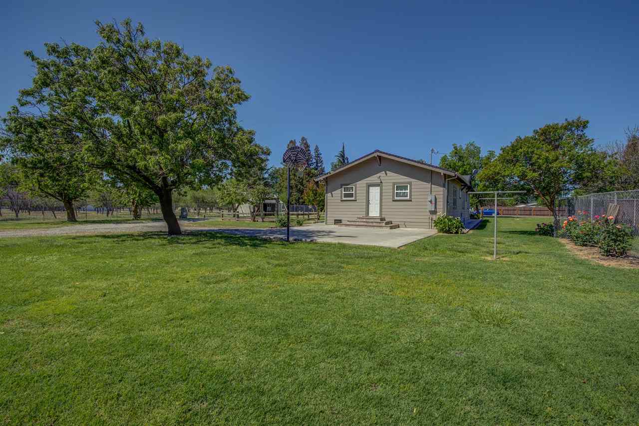 6110 Napa Road Corning, CA 96021 - Photo 52 of 62 a view of house with backyard