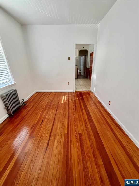 823 Glen Road, Unit 2S Fort Lee, NJ 07024 - Photo 4 of 4 a view of an empty room and wooden floor