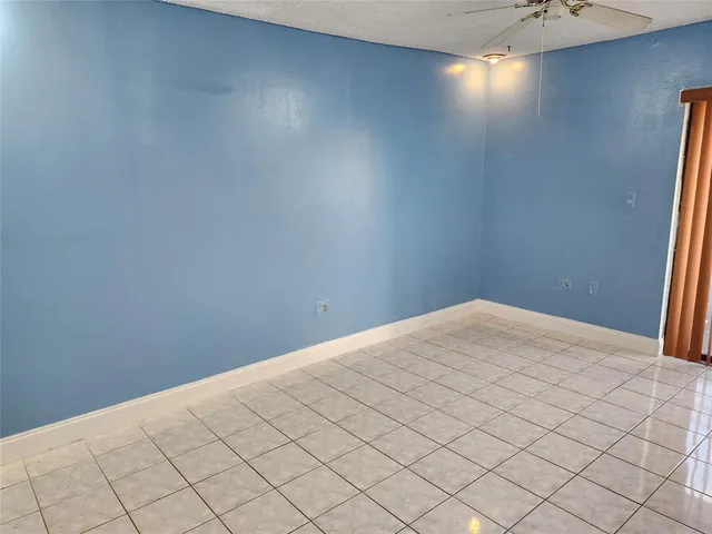 a bathroom with a white sink and a bathtub