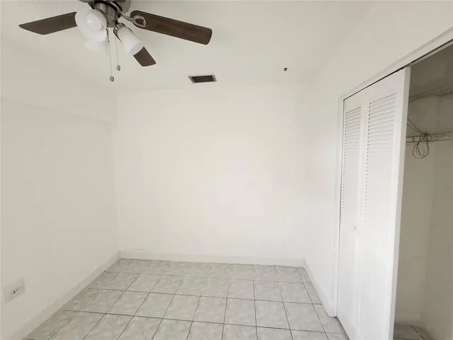 a view of a city street from a balcony