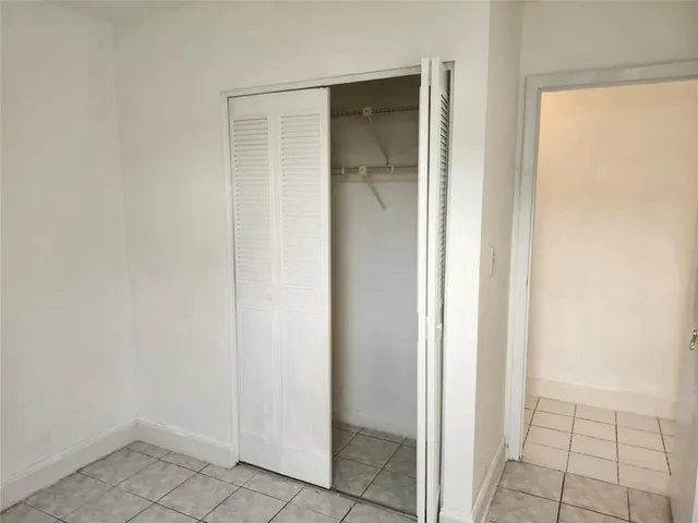 a view of balcony with furniture