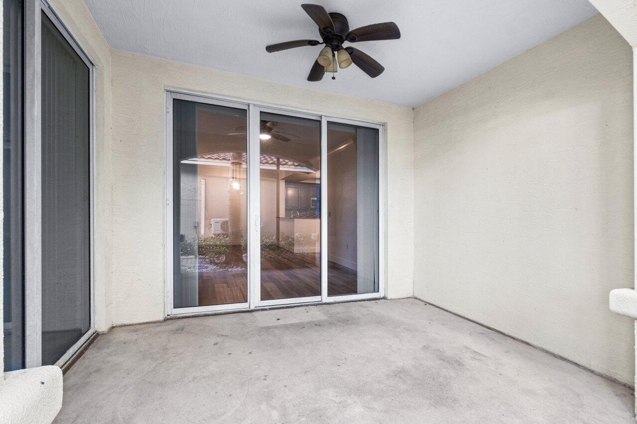 1117 Renaissance Way, Unit 117 Boynton Beach, FL 33426 - Photo 28 of 31 a view of room with a ceiling fan