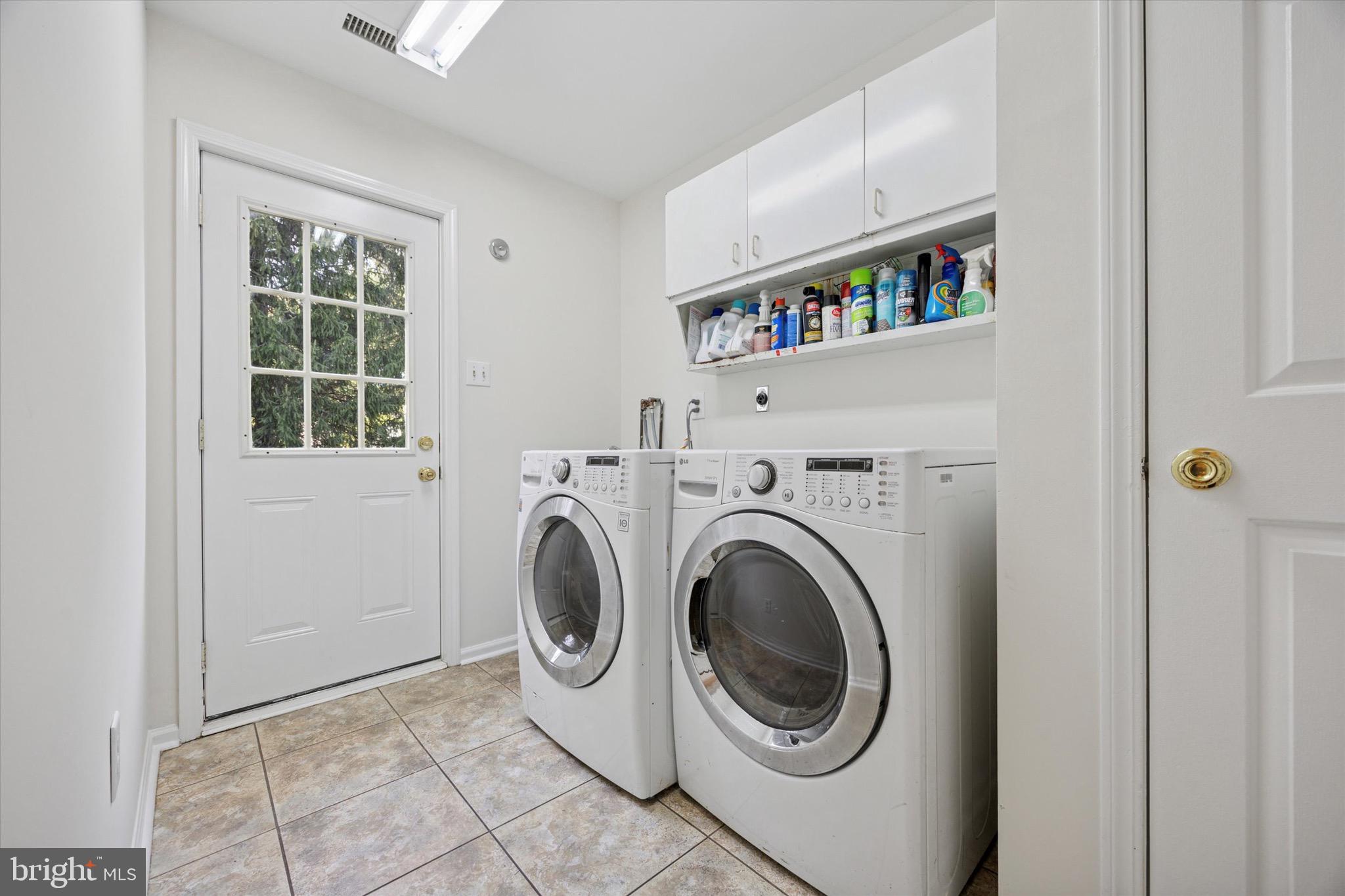 713 Buckley Road Blue Bell, PA 19422 - Photo 17 of 44 a utility room with closet dryer and washer