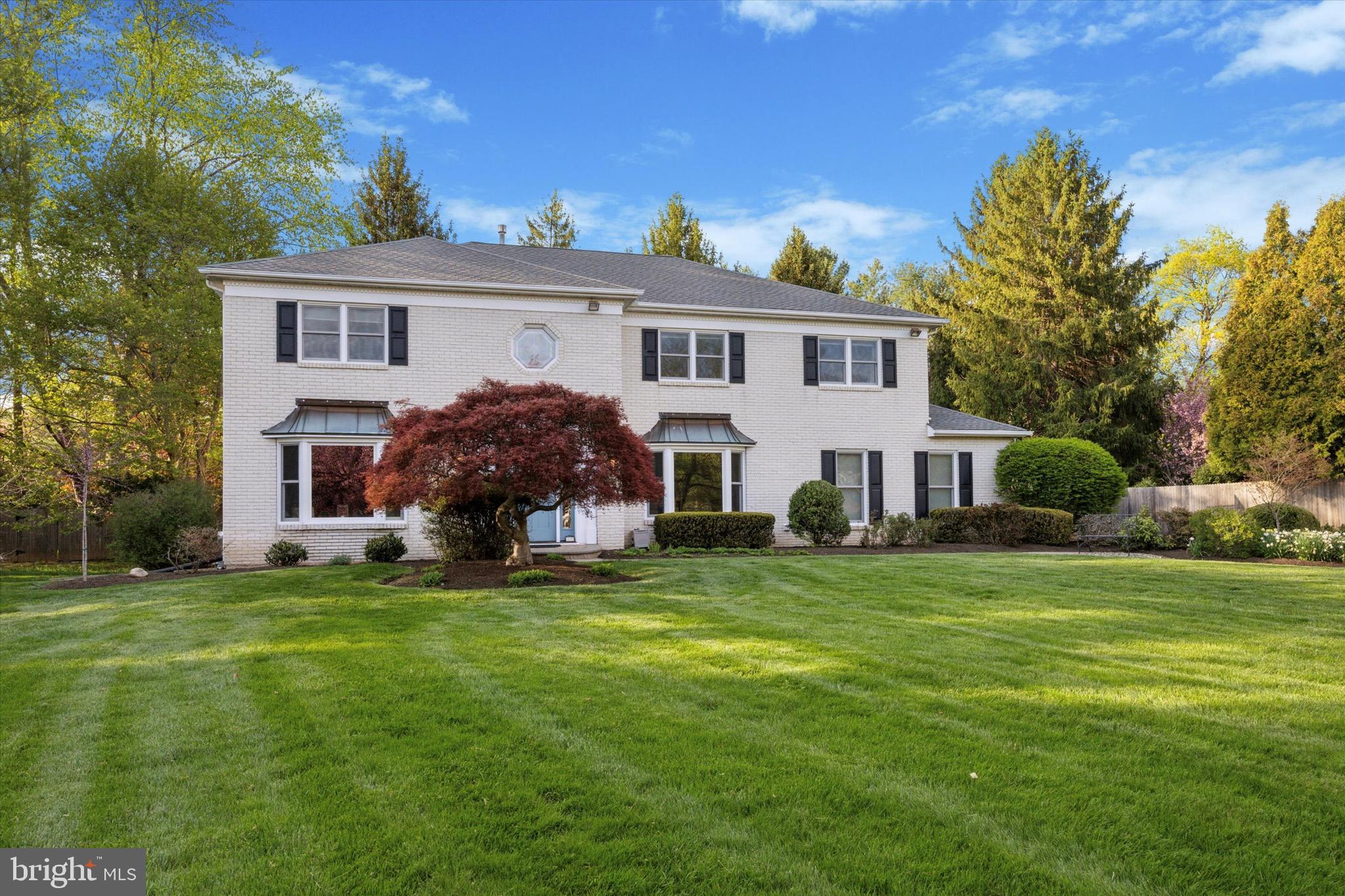 713 Buckley Road Blue Bell, PA 19422 - Photo 2 of 44 a view of a house with a big yard and potted plants