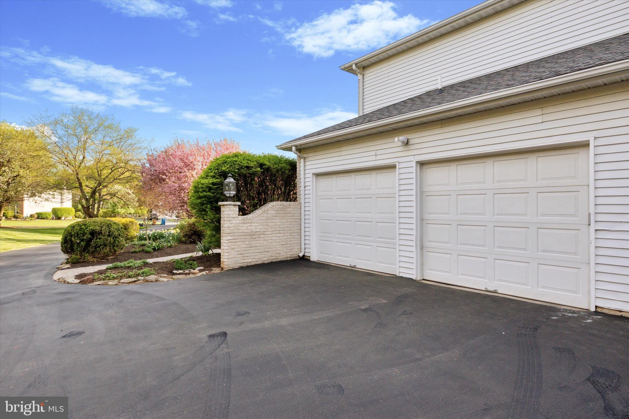 713 Buckley Road Blue Bell, PA 19422 - Photo 36 of 44 a view of a house with a yard and garage