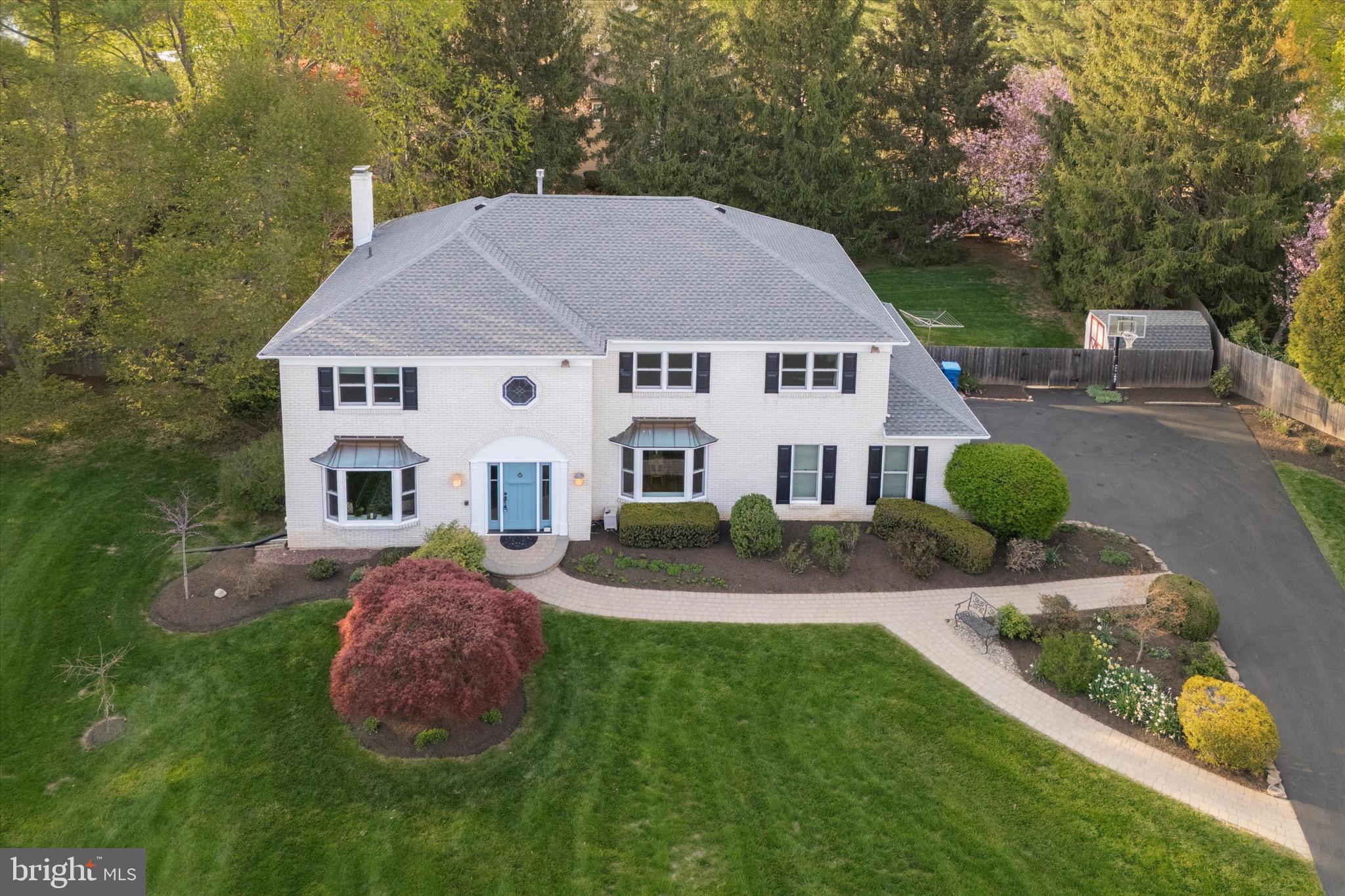 713 Buckley Road Blue Bell, PA 19422 - Photo 38 of 44 a aerial view of a house next to a yard