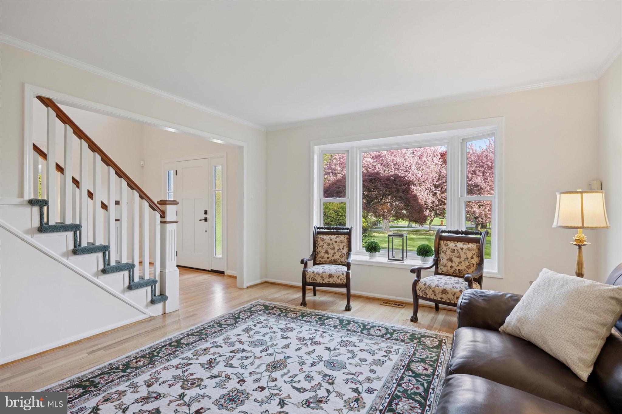 713 Buckley Road Blue Bell, PA 19422 - Photo 7 of 44 a living room with furniture and a rug