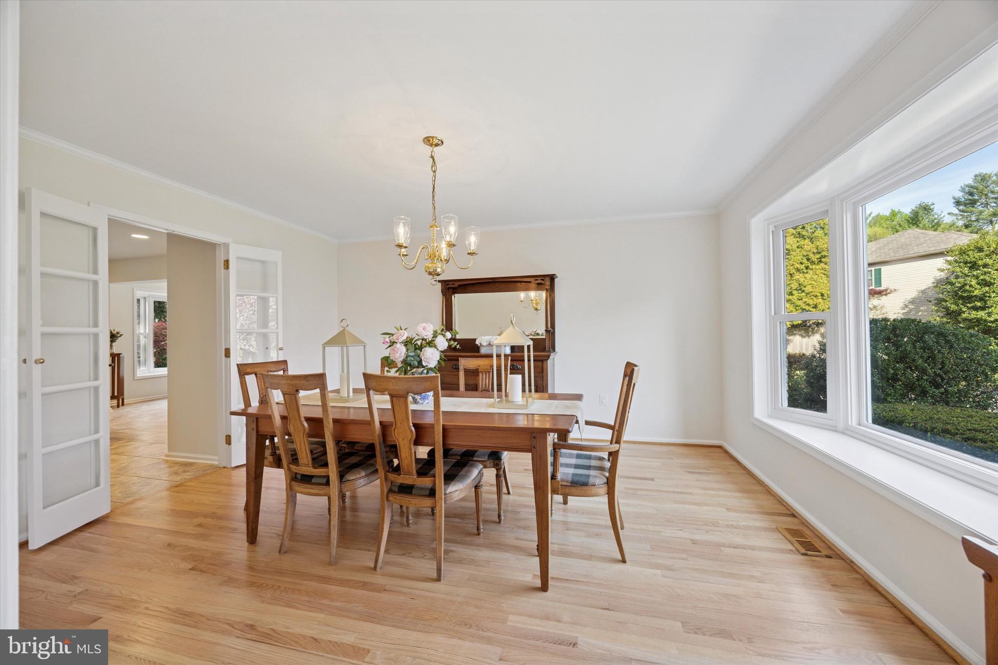 713 Buckley Road Blue Bell, PA 19422 - Photo 8 of 44 a view of a dining room with furniture window and wooden floor
