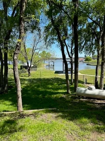 a view of a swimming pool with a garden