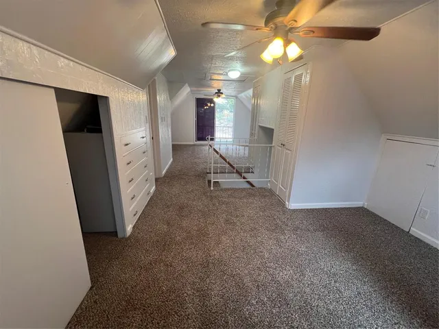 a view of a hallway with entryway