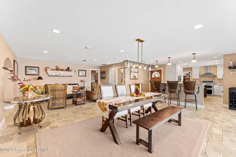 a view of a lake with houses in the back