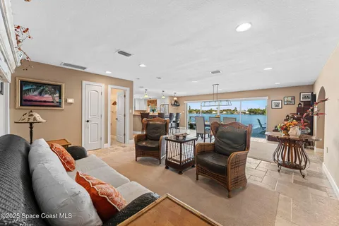 a view of a swimming pool with a lounge chair