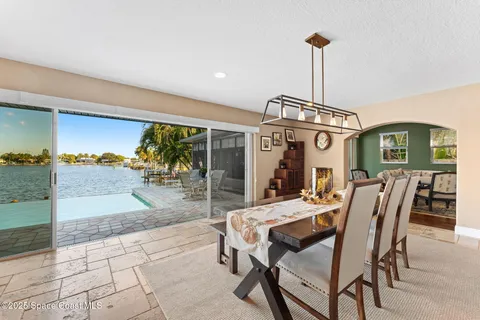 a view of a chairs and table in a lake