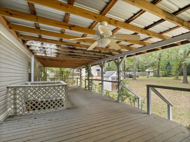 a view of outdoor space with wooden deck