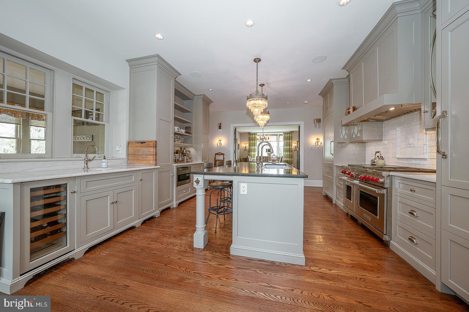 3501 Goshen Road Newtown Square, PA 19073 - Photo 36 of 79 a kitchen with stainless steel appliances a stove top oven and a refrigerator