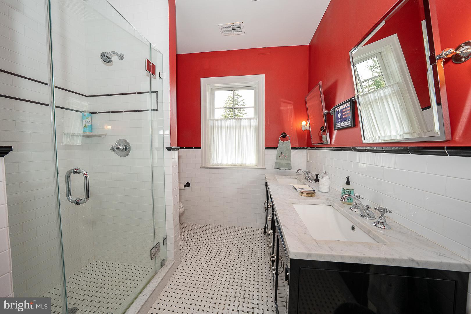 3501 Goshen Road Newtown Square, PA 19073 - Photo 47 of 79 a bathroom with a sink and a mirror