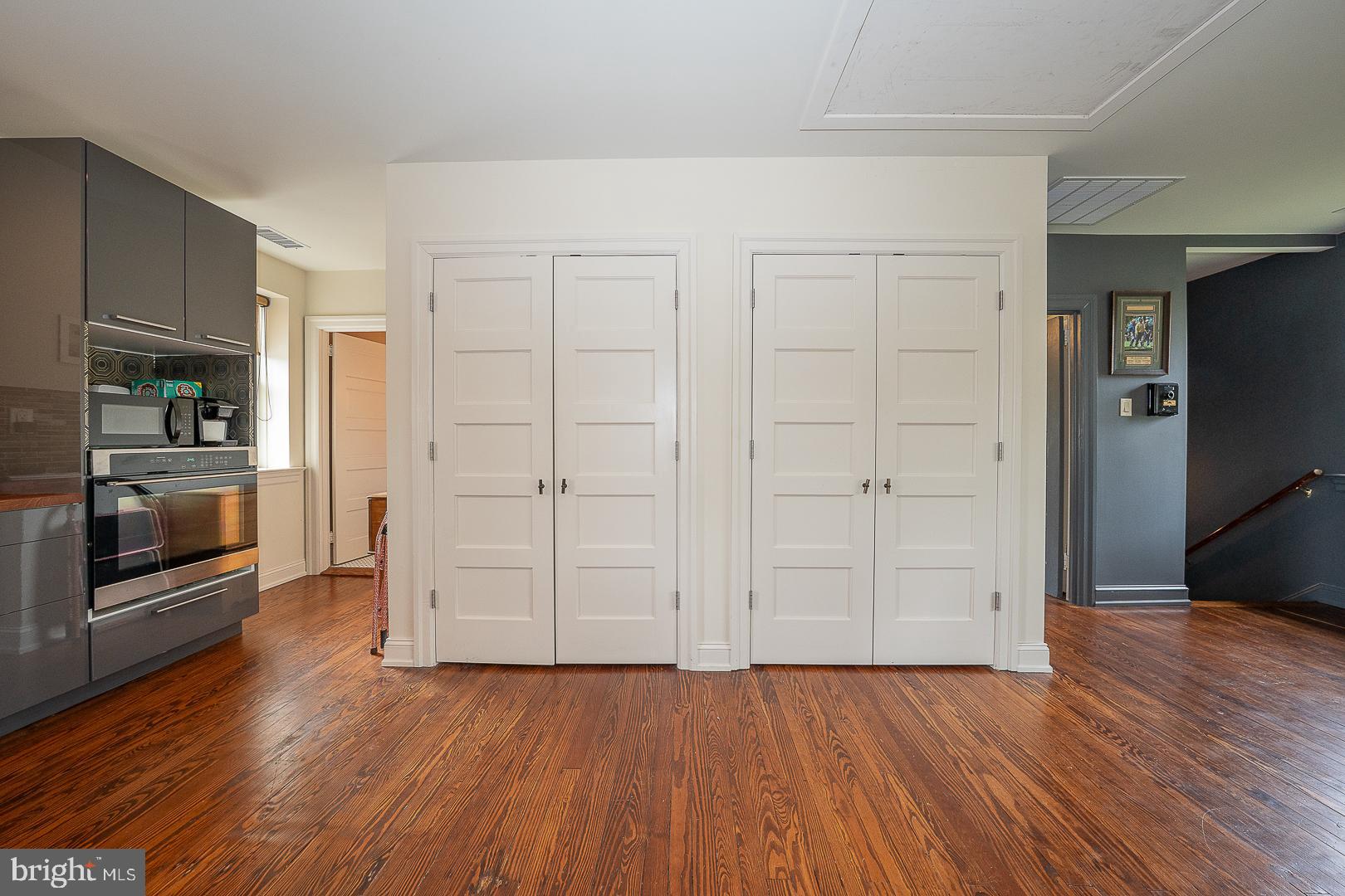 3501 Goshen Road Newtown Square, PA 19073 - Photo 59 of 79 an empty room with wooden floor tv and staircase