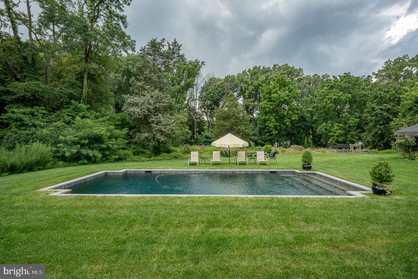 3501 Goshen Road Newtown Square, PA 19073 - Photo 68 of 79 a view of a swimming pool with a yard