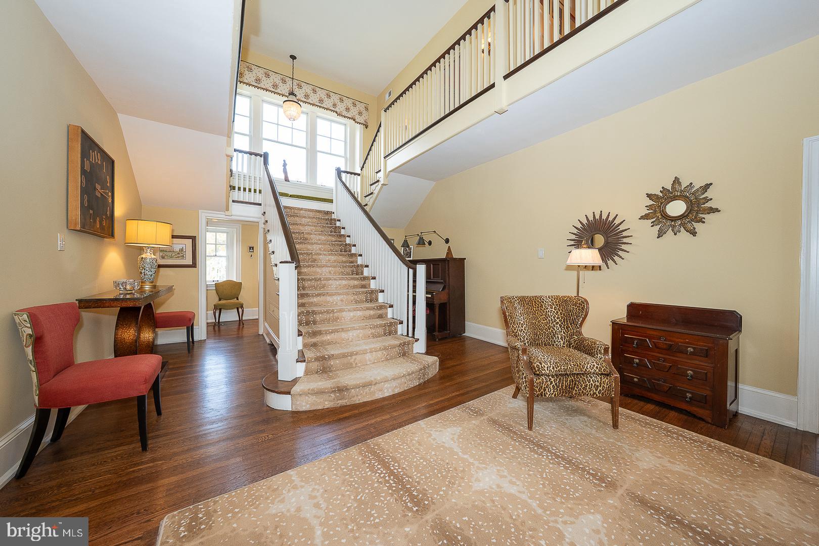 3501 Goshen Road Newtown Square, PA 19073 - Photo 9 of 79 a living room with couches and a potted plant on a coffee table with garden view