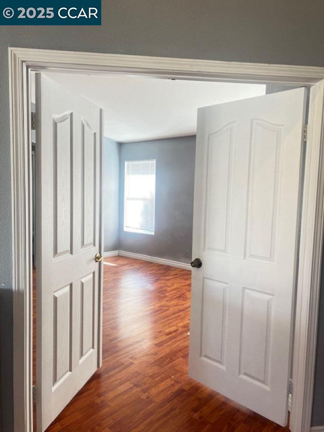 40123 Casillo Road Palmdale, CA 93550 - Photo 13 of 25 a view of empty room with wooden floor