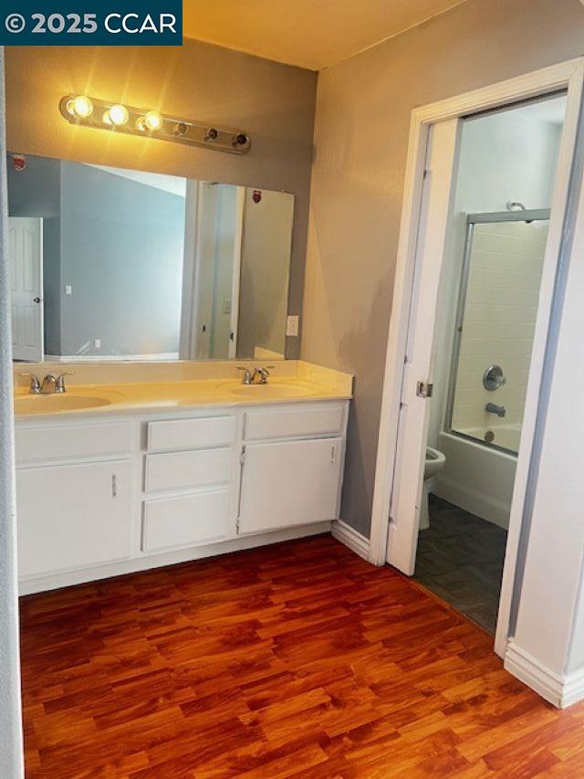 40123 Casillo Road Palmdale, CA 93550 - Photo 15 of 25 a view of a room with wooden floor and cabinet
