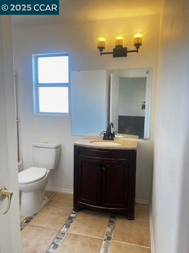 40123 Casillo Road Palmdale, CA 93550 - Photo 19 of 25 a bathroom with a sink vanity and a toilet