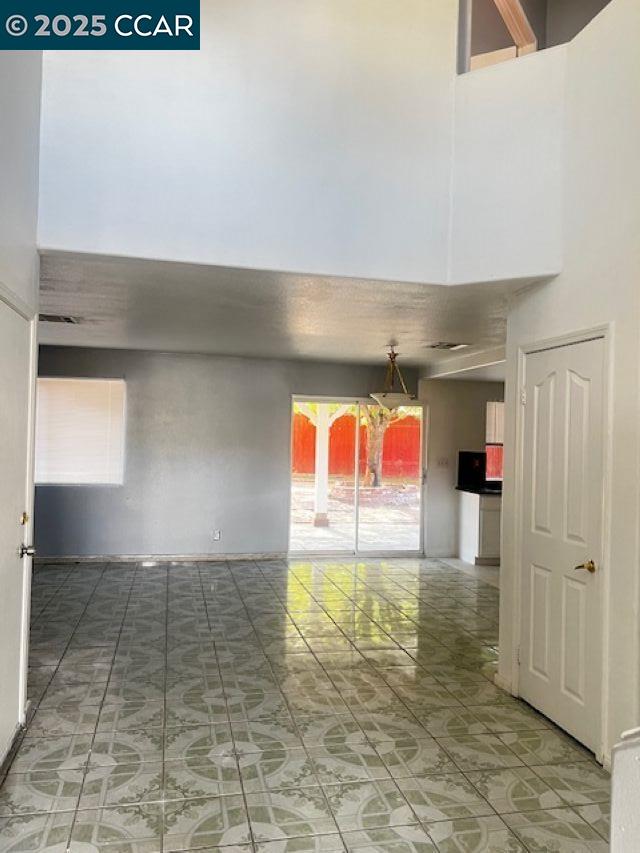 40123 Casillo Road Palmdale, CA 93550 - Photo 4 of 25 a view of empty room with wooden floor