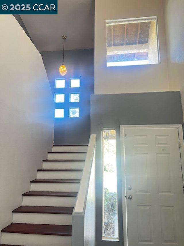 40123 Casillo Road Palmdale, CA 93550 - Photo 10 of 25 a view of staircase with white walls and a window