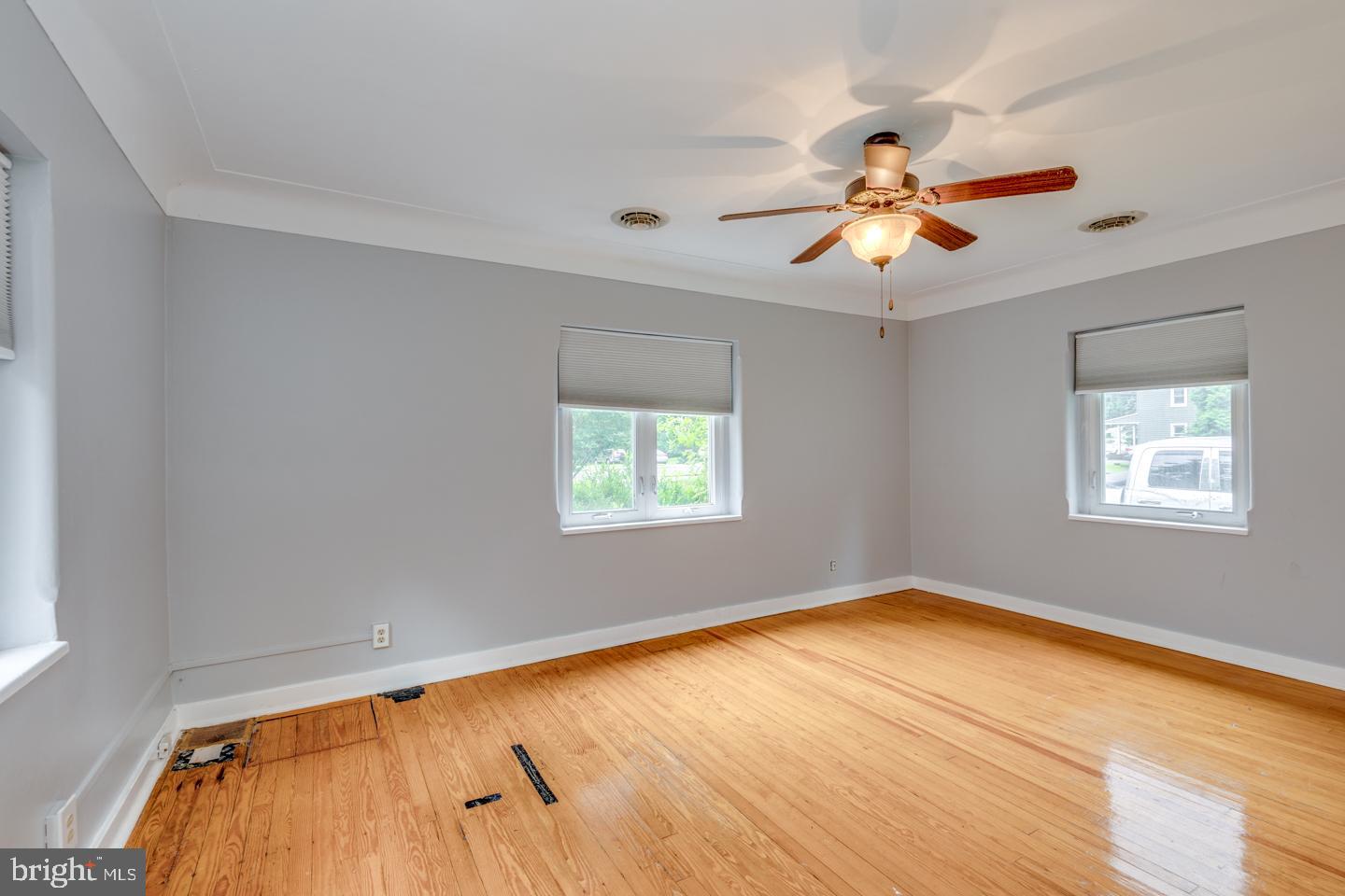 485 Main Street Lumberton, NJ 08048 - Photo 23 of 40 a view of empty room with wooden floor and fan
