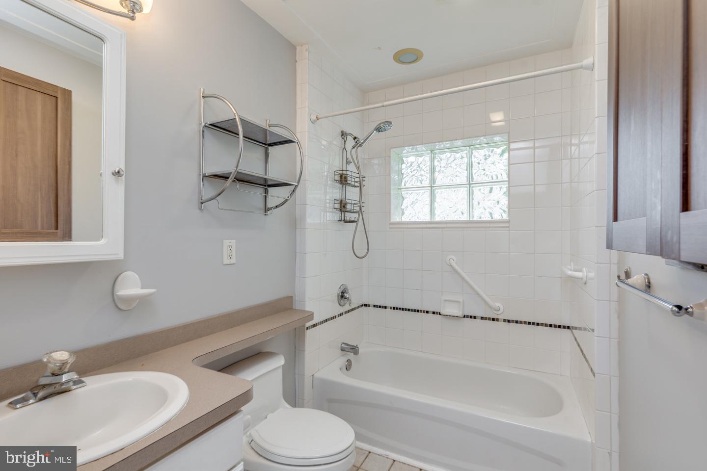 485 Main Street Lumberton, NJ 08048 - Photo 29 of 40 a bathroom with a granite countertop sink toilet and shower