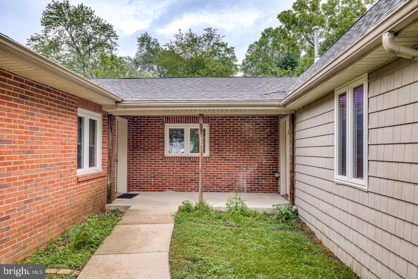 485 Main Street Lumberton, NJ 08048 - Photo 4 of 40 a front view of a house with garden